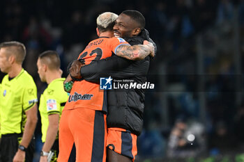 2023-12-03 - Federico Dimarco of FC Internazionale and Marcus Thuram of FC Internazionale they hug each other at the end of the race during Serie A between SSC Napoli vs FC Internazionale at Diego Armando Maradona Stadium - SSC NAPOLI VS INTER - FC INTERNAZIONALE - ITALIAN SERIE A - SOCCER