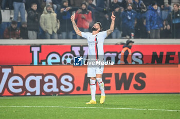 2023-12-09 - Olivier Giroud (Ac Milan) celebrating his goal - ATALANTA BC VS AC MILAN - ITALIAN SERIE A - SOCCER