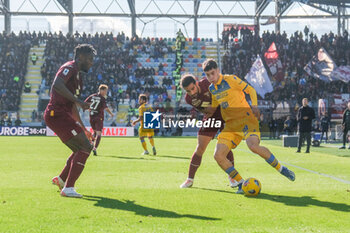 2023-12-10 - Frosinone's Argentinian forward Matias Soule challenges for the ball with Torino's Swiss defender Ricardo Rodriguez during the Serie A football match between Frosinone Calcio vs Torino at the Benito Stirpe stadium in Frosinone, Italy on December 10, 2023. - FROSINONE CALCIO VS TORINO FC - ITALIAN SERIE A - SOCCER
