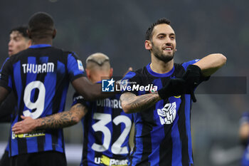 2023-12-09 - Hakan Calhanoglu of FC Internazionale celebrates after scoring a goal during Serie A 2023/24 football match between FC Internazionale and Udinese Calcio at Giuseppe Meazza Stadium, Milan, Italy on December 09, 2023 - INTER - FC INTERNAZIONALE VS UDINESE CALCIO - ITALIAN SERIE A - SOCCER