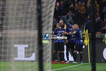 2023-12-09 - Federico Dimarco of FC Internazionale celebrates with his teammates after scoring a goal during Serie A 2023/24 football match between FC Internazionale and Udinese Calcio at Giuseppe Meazza Stadium, Milan, Italy on December 09, 2023 - INTER - FC INTERNAZIONALE VS UDINESE CALCIO - ITALIAN SERIE A - SOCCER
