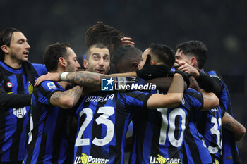 2023-12-09 - Marcus Thuram of FC Internazionale celebrates with his teammates after scoring a goal during Serie A 2023/24 football match between FC Internazionale and Udinese Calcio at Giuseppe Meazza Stadium, Milan, Italy on December 09, 2023 - INTER - FC INTERNAZIONALE VS UDINESE CALCIO - ITALIAN SERIE A - SOCCER