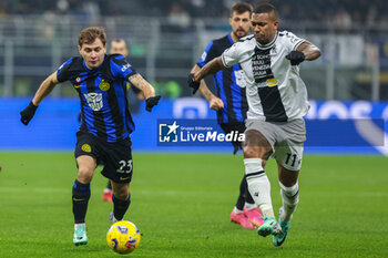 2023-12-09 - Nicolo Barella of FC Internazionale competes for the ball with Walace Souza Silva of Udinese Calcio during Serie A 2023/24 football match between FC Internazionale and Udinese Calcio at Giuseppe Meazza Stadium, Milan, Italy on December 09, 2023 - INTER - FC INTERNAZIONALE VS UDINESE CALCIO - ITALIAN SERIE A - SOCCER