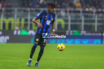 2023-12-09 - Yann Aurel Ludger Bissek of FC Internazionale seen in action during Serie A 2023/24 football match between FC Internazionale and Udinese Calcio at Giuseppe Meazza Stadium, Milan, Italy on December 09, 2023 - INTER - FC INTERNAZIONALE VS UDINESE CALCIO - ITALIAN SERIE A - SOCCER