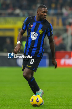 2023-12-09 - Marcus Thuram of FC Internazionale seen in action during Serie A 2023/24 football match between FC Internazionale and Udinese Calcio at Giuseppe Meazza Stadium, Milan, Italy on December 09, 2023 - INTER - FC INTERNAZIONALE VS UDINESE CALCIO - ITALIAN SERIE A - SOCCER
