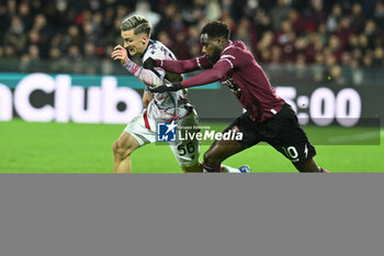 2023-12-10 - Alexis Saelemaekers of Bologna FC competes for the ball with Boulaye Dia of US Salernitana 1919 during Serie A between US Salernitana 1919 vs Bologna FC 1909 at Arechi Stadium - US SALERNITANA VS BOLOGNA FC - ITALIAN SERIE A - SOCCER