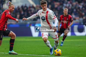 2023-12-17 - Lorenzo Colombo of AC Monza seen in action during Serie A 2023/24 football match between AC Milan and AC Monza at San Siro Stadium, Milan, Italy on December 17, 2023 - AC MILAN VS AC MONZA - ITALIAN SERIE A - SOCCER