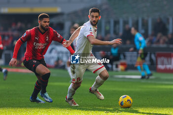 2023-12-17 - Roberto Gagliardini of AC Monza competes for the ball with Ruben Loftus-Cheek of AC Milan during Serie A 2023/24 football match between AC Milan and AC Monza at San Siro Stadium, Milan, Italy on December 17, 2023 - AC MILAN VS AC MONZA - ITALIAN SERIE A - SOCCER