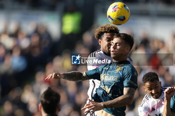 2023-12-23 - Juventus' American midfielder Weston McKennie challenges for the ball with Frosinone's Argentinian midfielder Enzo Barrenechea during the Serie A football match between Frosinone Calcio vs Juventus FC at the Benito Stirpe stadium in Frosinone, Italy on December 23, 2023. - FROSINONE CALCIO VS JUVENTUS FC - ITALIAN SERIE A - SOCCER