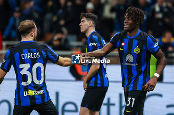 2023-12-23 - Yann Aurel Ludger Bissek of FC Internazionale celebrates with his teammates after scoring a goal during Serie A 2023/24 football match between FC Internazionale and US Lecce at Giuseppe Meazza Stadium, Milan, Italy on December 23, 2023 - INTER - FC INTERNAZIONALE VS US LECCE - ITALIAN SERIE A - SOCCER