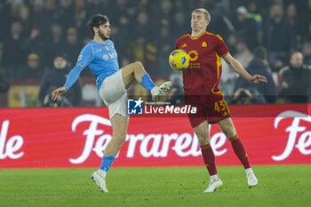 2023-12-23 - SSC Napoli’s forward Khvicha Kvaratskhelia challenges for the ball with Roma’s Danish defender Rasmus Kristensen during the Serie A football match between AS Roma vs SSC Napoli Football Club at the Olimpico Stadium in Rome, Italy on December 23, 2023 - AS ROMA VS SSC NAPOLI - ITALIAN SERIE A - SOCCER