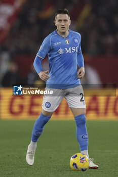 2023-12-23 - SSC Napoli's Polish midfielder Piotr Zielinski controls the ball during the Serie A football match between AS Roma vs SSC Napoli Football Club at the Olimpico Stadium in Rome, Italy on December 23, 2023 - AS ROMA VS SSC NAPOLI - ITALIAN SERIE A - SOCCER