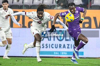 2023-12-29 - Torino's Adrien Tameze fights for the ball against Fiorentina's Christian Kouame - ACF FIORENTINA VS TORINO FC - ITALIAN SERIE A - SOCCER