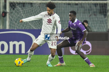 2023-12-29 - Torino's Valentino Lazaro hampered by Fiorentina's Micheal Kayode - ACF FIORENTINA VS TORINO FC - ITALIAN SERIE A - SOCCER