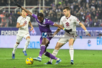 2023-12-29 - Fiorentina's Christian Kouame hampered by Torino's Alessandro Buongiorno - ACF FIORENTINA VS TORINO FC - ITALIAN SERIE A - SOCCER