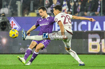 2023-12-29 - Fiorentina's Giacomo Bonaventura thwarted by Torino's Samuele Ricci - ACF FIORENTINA VS TORINO FC - ITALIAN SERIE A - SOCCER