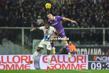 2023-12-29 - header of Fiorentina's Nikola Milenkovic against Torino's Duvan Zapata - ACF FIORENTINA VS TORINO FC - ITALIAN SERIE A - SOCCER