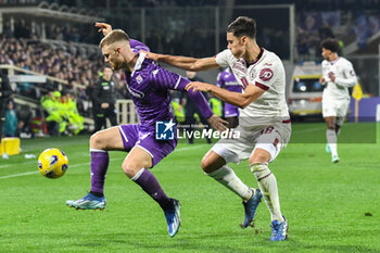 2023-12-29 - Fiorentina's Lucas Beltran hampered by Torino's Samuele Ricci - ACF FIORENTINA VS TORINO FC - ITALIAN SERIE A - SOCCER