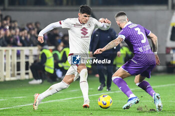 2023-12-29 - Torino's Raoul Bellanove hampered by Fiorentina's Cristiano Biraghi - ACF FIORENTINA VS TORINO FC - ITALIAN SERIE A - SOCCER