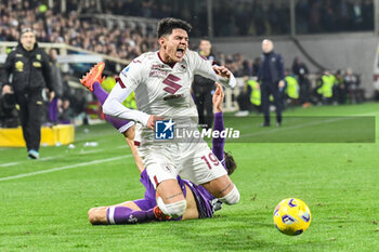 2023-12-29 - Torino's Raoul Bellanova is fouled by Fiorentina's Luca Ranieri - ACF FIORENTINA VS TORINO FC - ITALIAN SERIE A - SOCCER