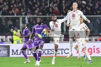 2023-12-29 - Torino's Adrien Tameze fights for the ball against Fiorentina's M'Bala Nzola - ACF FIORENTINA VS TORINO FC - ITALIAN SERIE A - SOCCER