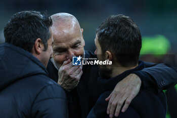 2023-12-30 - Stefano Pioli Head Coach of AC Milan talks to Alessio Dionisi Head Coach of US Sassuolo during Serie A 2023/24 football match between AC Milan and US Sassuolo at San Siro Stadium, Milan, Italy on December 30, 2023 - AC MILAN VS US SASSUOLO - ITALIAN SERIE A - SOCCER