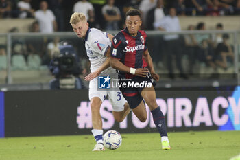 2023-09-18 - Dan Ndoye of Bologna FC battle for the ball with Josh Doig of Hellas Verona FC during Hellas Verona FC vs Bologna FC, 4° Serie A Tim 2023-24 game at Marcantonio Bentegodi Stadium in Verona, Italy, on September 18, 2023. - HELLAS VERONA FC VS BOLOGNA FC - ITALIAN SERIE A - SOCCER