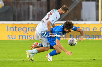 2023-09-27 - Empoli's Stiven Shpendi is fouled by Salernitana's Norbert Gyomber - EMPOLI FC VS US SALERNITANA - ITALIAN SERIE A - SOCCER