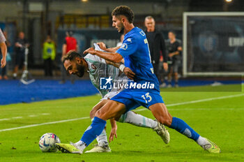 2023-09-27 - Empoli's Liberato Cacace fights for the ball against Salernitana's Grigoris Kastanos - EMPOLI FC VS US SALERNITANA - ITALIAN SERIE A - SOCCER