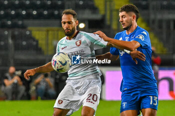 2023-09-27 - Empoli's Liberato Cacace fights for the ball against Salernitana's Grigoris Kastanos - EMPOLI FC VS US SALERNITANA - ITALIAN SERIE A - SOCCER