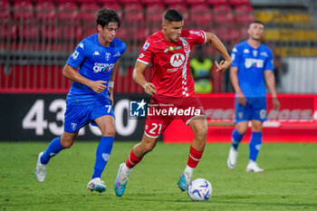 2023-08-26 - Valentin Carboni (#21 AC Monza) during the Italian championship Serie A football match between AC Monza and Empoli FC on August 26, 2023 at U-Power Stadium in Monza, Italy - FOOTBALL - ITALIAN CHAMP - MONZA V EMPOLI - ITALIAN SERIE A - SOCCER