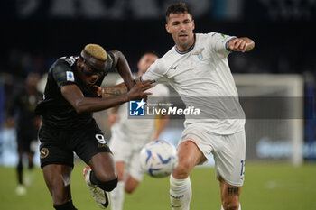 2023-09-02 - Victor Osimen of SSC Napoli competes for the ball with Alessio Romagnoli of SS Lazio during Serie A between SSC Napoli vs SS Lazio at Diego Armando Maradona Stadium - SSC NAPOLI VS SS LAZIO - ITALIAN SERIE A - SOCCER