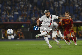 2023-09-01 - Olivier Giroud of A.C. Milan score 0-1 during the 3rd day of the Serie A Championship between A.S. Roma - A.C. Milan on September 1, 2023 at the Olympic Stadium in Rome, Italy. - AS ROMA VS AC MILAN - ITALIAN SERIE A - SOCCER