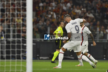 2023-09-01 - Olivier Giroud of A.C. Milan celebrates after scoring 0-1 during the 3rd day of the Serie A Championship between A.S. Roma - A.C. Milan on September 1, 2023 at the Olympic Stadium in Rome, Italy. - AS ROMA VS AC MILAN - ITALIAN SERIE A - SOCCER