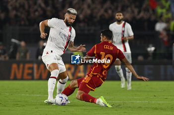 2023-09-01 - Olivier Giroud of A.C. Milan and Zeki Celik of A.S. Roma during the 3rd day of the Serie A Championship between A.S. Roma - A.C. Milan on September 1, 2023 at the Olympic Stadium in Rome, Italy. - AS ROMA VS AC MILAN - ITALIAN SERIE A - SOCCER