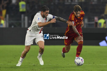 2023-09-01 - Calabria of A.C. Milan and Zalewski of A.S. Roma during the 3rd day of the Serie A Championship between A.S. Roma - A.C. Milan on September 1, 2023 at the Olympic Stadium in Rome, Italy. - AS ROMA VS AC MILAN - ITALIAN SERIE A - SOCCER
