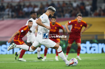 2023-09-01 - Olivier Giroud of Milan scores 0-1 goal by penalty during the Italian championship Serie A football match between AS Roma and AC Milan on September 1, 2023 at Stadio Olimpico in Rome, Italy - FOOTBALL - ITALIAN CHAMP - AS ROMA V AC MILAN - ITALIAN SERIE A - SOCCER