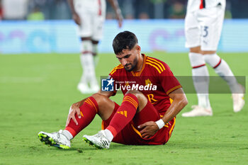 2023-09-01 - Houssem Aouar of Roma reacts after being injured during the Italian championship Serie A football match between AS Roma and AC Milan on September 1, 2023 at Stadio Olimpico in Rome, Italy - FOOTBALL - ITALIAN CHAMP - AS ROMA V AC MILAN - ITALIAN SERIE A - SOCCER