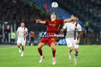 2023-09-01 - Diego Llorente of Roma vies for the ball with Ruben Loftus-Cheek of Milan (R) during the Italian championship Serie A football match between AS Roma and AC Milan on September 1, 2023 at Stadio Olimpico in Rome, Italy - FOOTBALL - ITALIAN CHAMP - AS ROMA V AC MILAN - ITALIAN SERIE A - SOCCER
