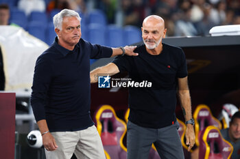 2023-09-01 - Jose' Mourinho head coach of Roma (L) and Stefano Pioli head coach of Milan (R) greet each other before the Italian championship Serie A football match between AS Roma and AC Milan on September 1, 2023 at Stadio Olimpico in Rome, Italy - FOOTBALL - ITALIAN CHAMP - AS ROMA V AC MILAN - ITALIAN SERIE A - SOCCER