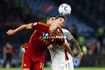 2023-09-01 - Diego Llorente of Roma (L) goes for a header with Christian Pulisic of Milan (R) during the Italian championship Serie A football match between AS Roma and AC Milan on September 1, 2023 at Stadio Olimpico in Rome, Italy - FOOTBALL - ITALIAN CHAMP - AS ROMA V AC MILAN - ITALIAN SERIE A - SOCCER