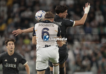 2023-09-26 - Federico Baschirotto of Us Lecce and Dusan Vlahovic of Juventus during the Italian Serie A, football match between Juventus Fc and Us Lecce on 26 September 2023 at Allianz stadium, Turin, Italy. Photo Nderim Kaceli - JUVENTUS FC VS US LECCE - ITALIAN SERIE A - SOCCER