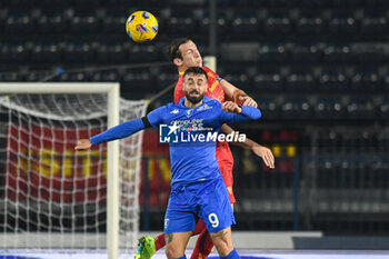 2023-12-11 - header of Federico Baschirotto (Lecce) against Francesco Caputo (Empoli) - EMPOLI FC VS US LECCE - ITALIAN SERIE A - SOCCER