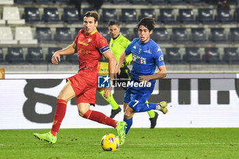 2023-12-11 - Federico Baschirotto (Lecce).hampered by Youssef Maleh (Empoli) - EMPOLI FC VS US LECCE - ITALIAN SERIE A - SOCCER