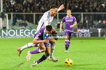 2023-11-05 - Fiorentina's Nicolas Gonzalez is fouled by Juventus's Filip Kostic - ACF FIORENTINA VS JUVENTUS FC - ITALIAN SERIE A - SOCCER
