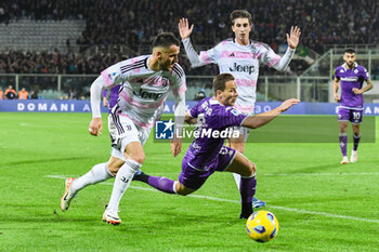 2023-11-05 - Fiorentina's Arthur is fouled by Juventus's Filip Kostic - ACF FIORENTINA VS JUVENTUS FC - ITALIAN SERIE A - SOCCER