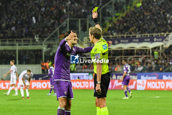 2023-11-05 - Referee Luca Massimi showes yellow card to Fiorentina's Luca Ranieri - ACF FIORENTINA VS JUVENTUS FC - ITALIAN SERIE A - SOCCER