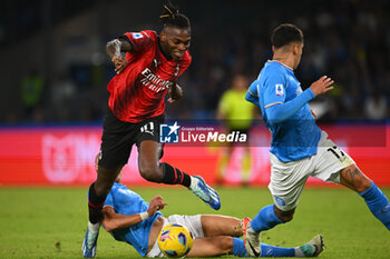 2023-10-29 - Rafael Leao of AC Milan competes for the ball with Mathias Olivera of SSC Napoli the Serie A match between SSC Napoli vs AC Milan at Diego Armando Maradona Stadium - SSC NAPOLI VS AC MILAN - ITALIAN SERIE A - SOCCER