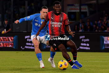 2023-10-29 - Piotr Zielinski of SSC Napoli competes for the ball with Yunus Musah of AC Milan the Serie A match between SSC Napoli vs AC Milan at Diego Armando Maradona Stadium - SSC NAPOLI VS AC MILAN - ITALIAN SERIE A - SOCCER