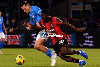2023-10-29 - Piotr Zielinski of SSC Napoli competes for the ball with Yunus Musah of AC Milan the Serie A match between SSC Napoli vs AC Milan at Diego Armando Maradona Stadium - SSC NAPOLI VS AC MILAN - ITALIAN SERIE A - SOCCER